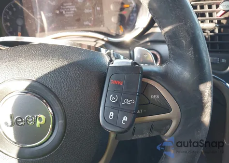 2014 Jeep Grand Cherokee Altitude z USA, uszkodzony, nr VIN 1C4RJFAG3EC569885